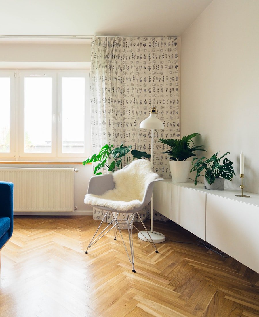 Cozy living room with warm lamp light and neutral sofa