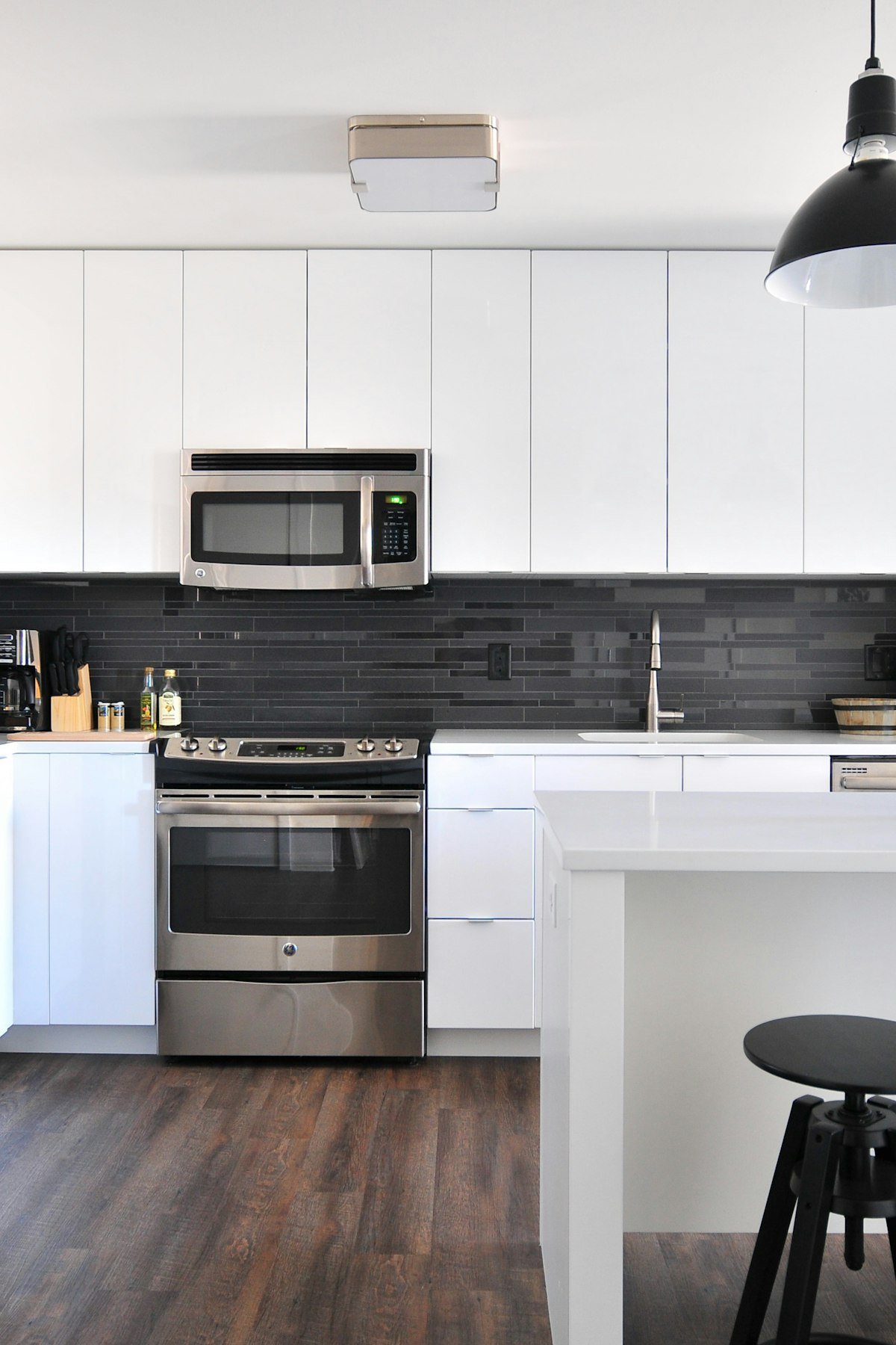 Modern farmhouse kitchen and dining space with warm neutral palette