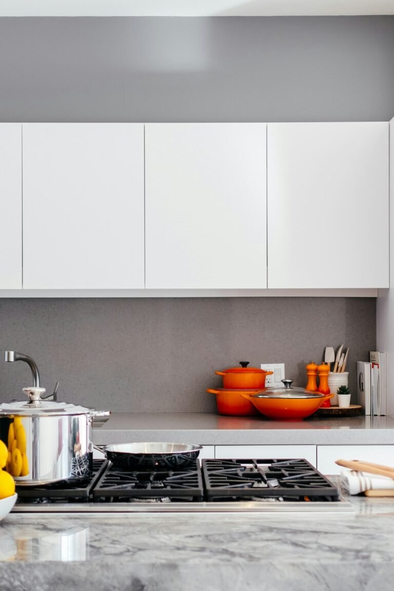 Warm wood kitchen with open shelving and natural light
